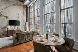 Chic loft w/ gym & rooftop firepit near downtown - Image 2